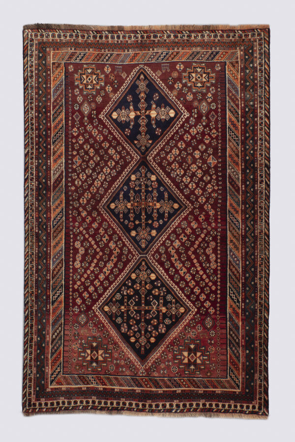 Qashqai triple-medallion rug